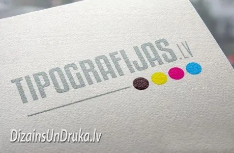 Логотип компании Tipografijas.lv с цветными точками на текстурированной бумаге
