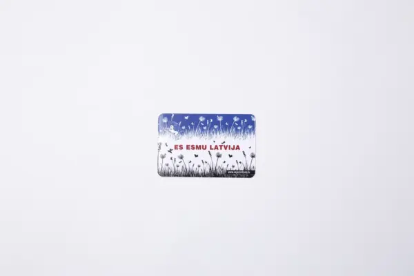 Custom pocket calendar with meadow illustration and red text ES ESMU LATVIJA