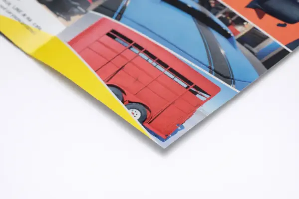 Folded custom booklet with vehicle images, showing custom booklet printing