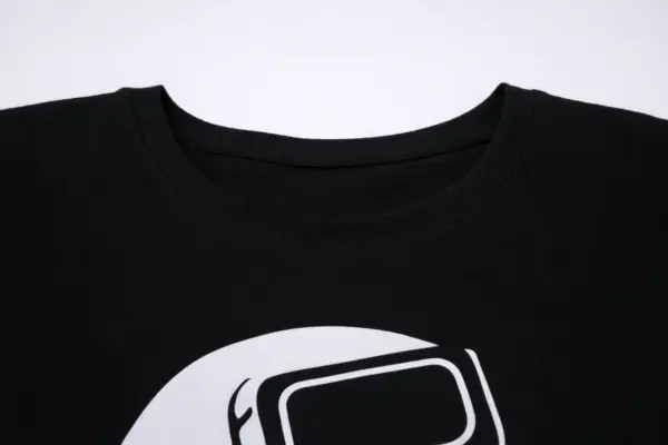 Close-up of a black custom t-shirt with print and a round neckline