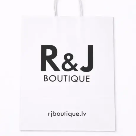 White custom paper bag with black R&J BOUTIQUE print