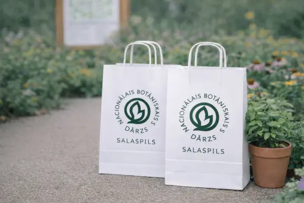 White custom paper bags with print for the National Botanic Garden Salaspils