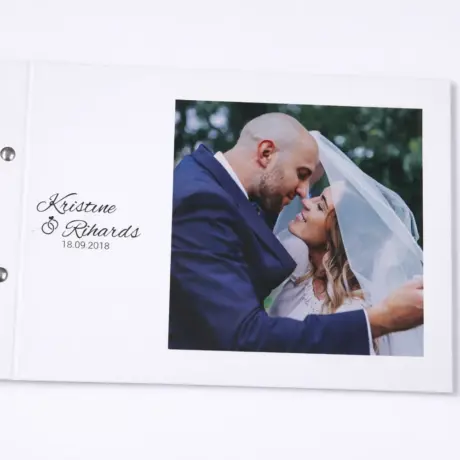Custom photo book with white cover and newlyweds' photo