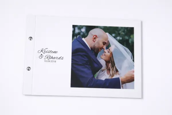 Custom photo book with white cover and newlyweds' photo