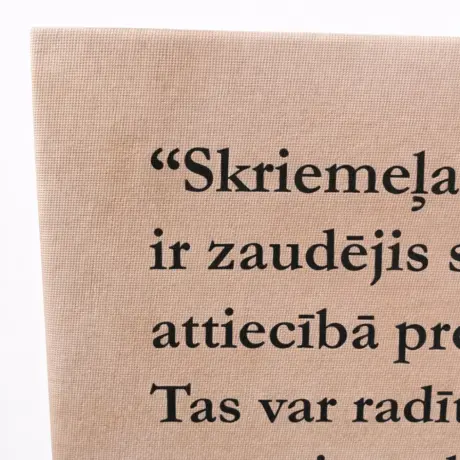Close-up of custom canvas printing with visible fabric texture and text