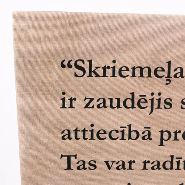 Close-up of custom canvas printing with visible fabric texture and text