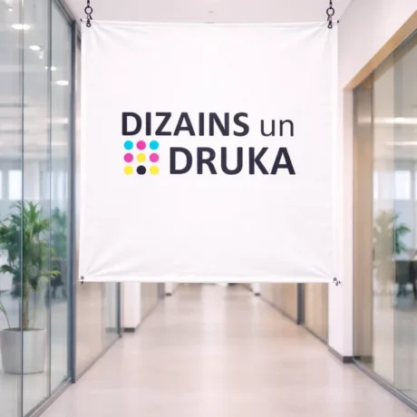 Custom banner printing sample: white banner with 'Design and Print' in an office hallway