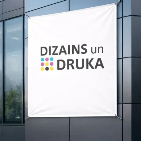 Custom banner printing on a building facade with the text Design and Print