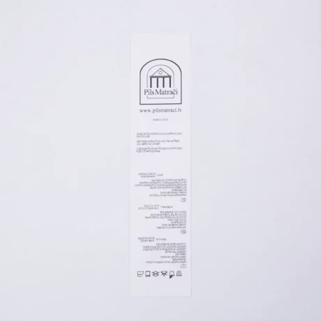 White custom nylon label printing with Pils Matrači logo and care instructions