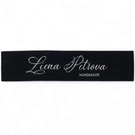 Черная тканая жаккардовая бирка с надписью Liena Petrova HANDMADE